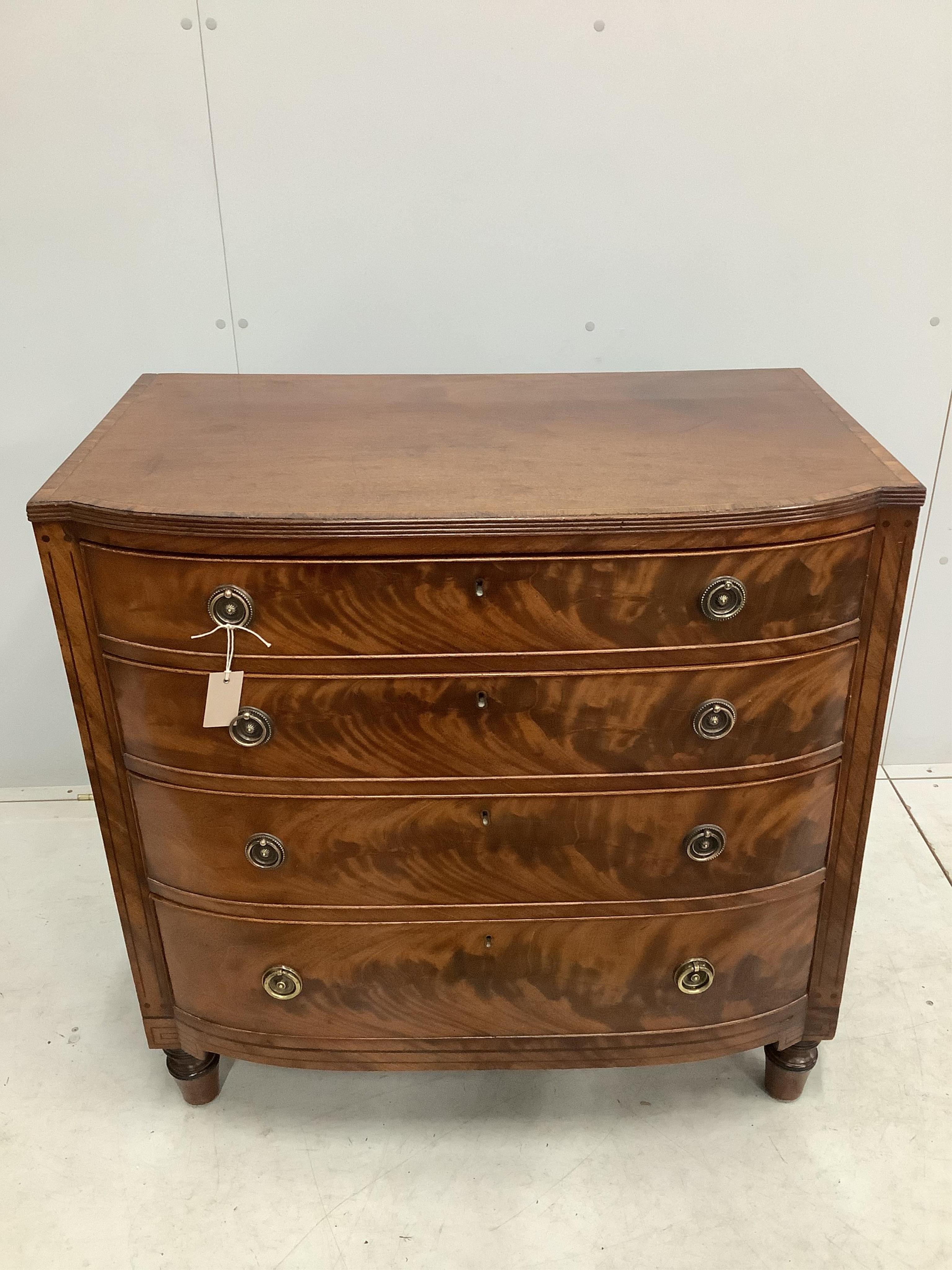 A Regency rosewood banded mahogany bow front chest, width 92cm, depth 54cm, height 91cm. Condition - fair